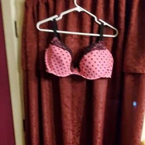 Pink and black pokadotted lace bra